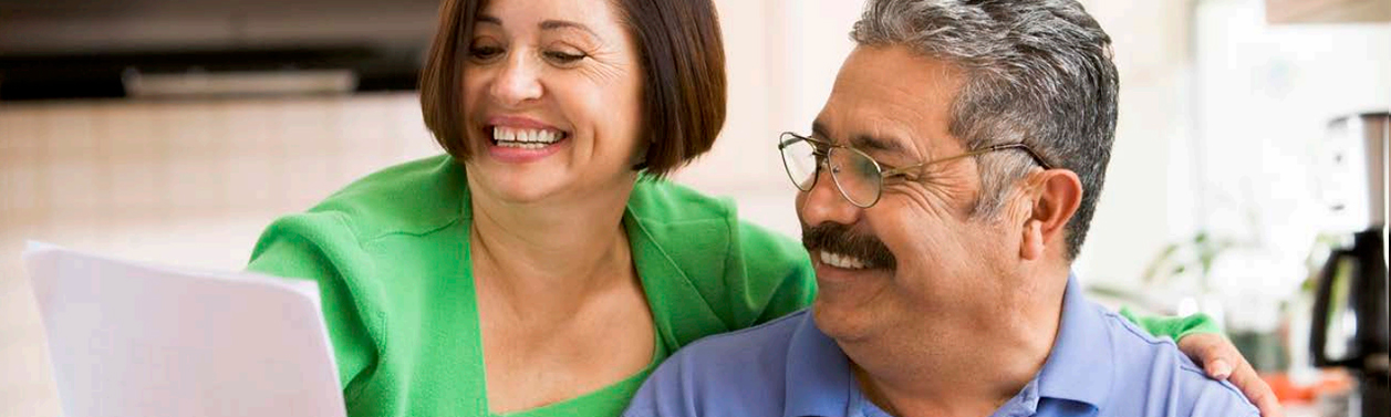 Older couple looking at documents.